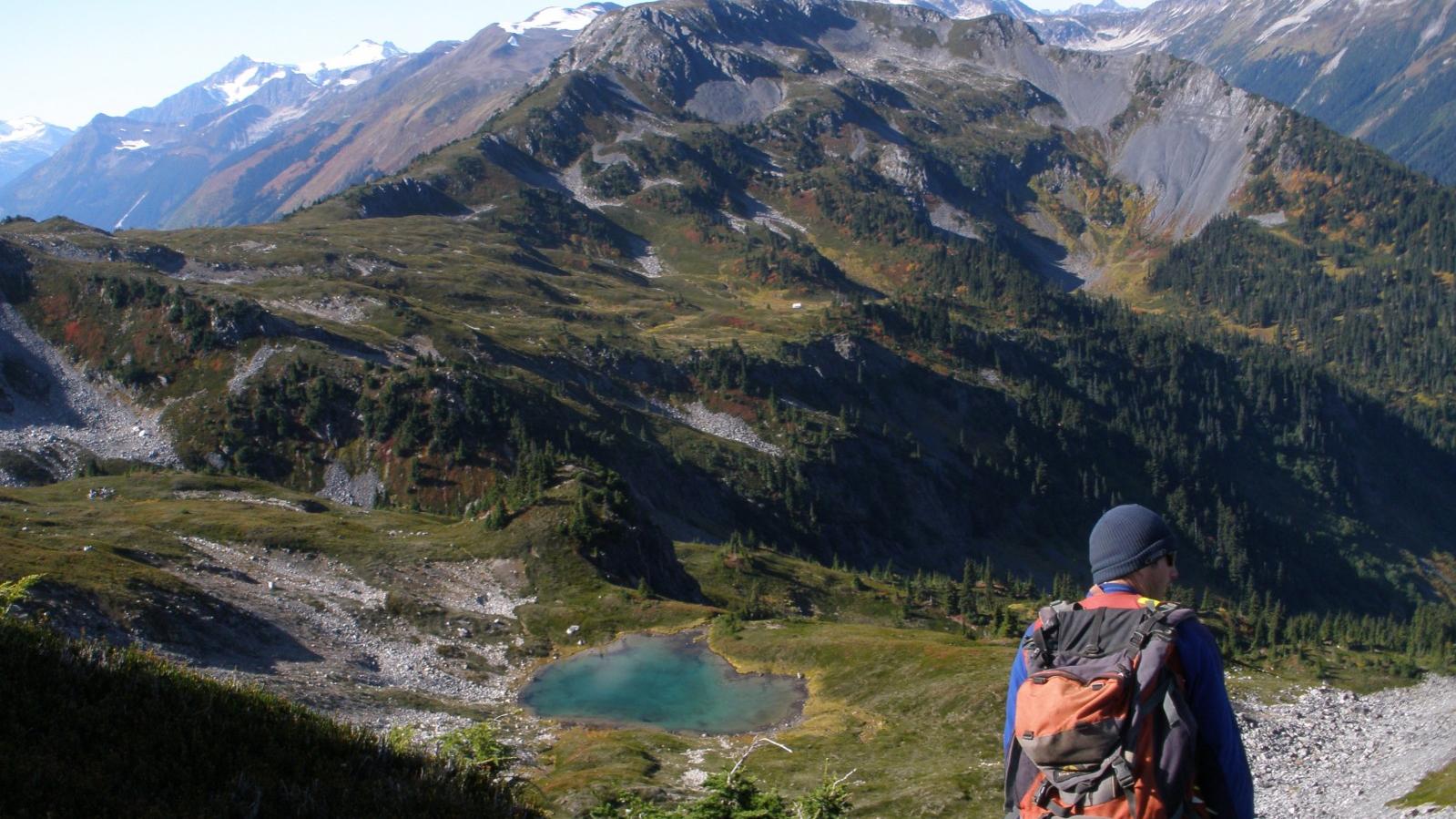 Geological Crew Memeber Overlooking the Exploration Camp the West Cu-Au Zone of the Elsiar Property in Northwestern British Columbia