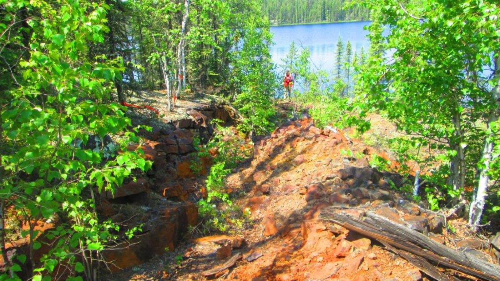 A rusty outcrop exposed at a uranium exploration project in Northern Saskatchewan